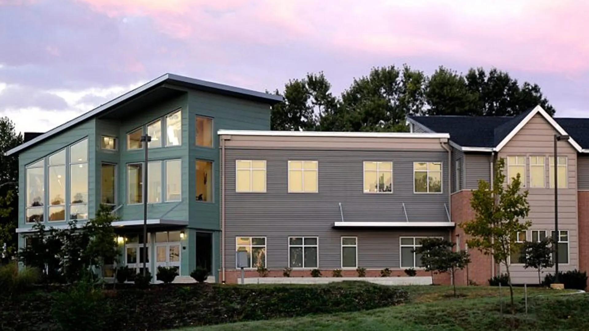 The Arundel Lodge main campus building in Edgewater at dusk